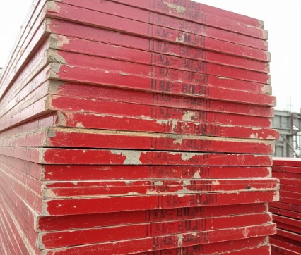 Stacked shuttering ply sheets showing multiple reuse cycles